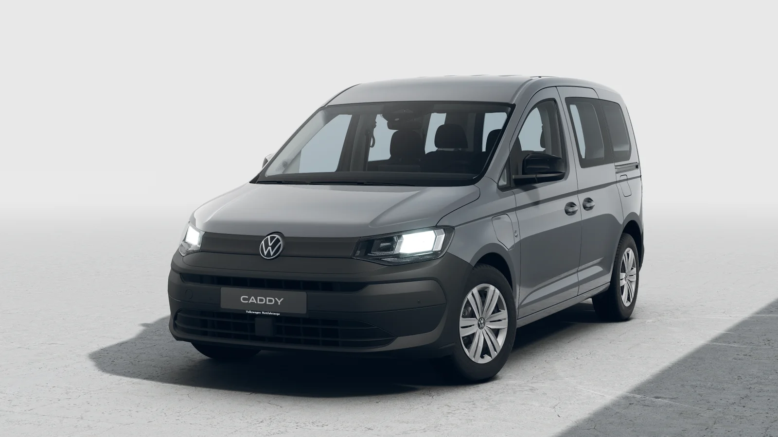 Grauer Caddy in seitlicher Frontansicht.png