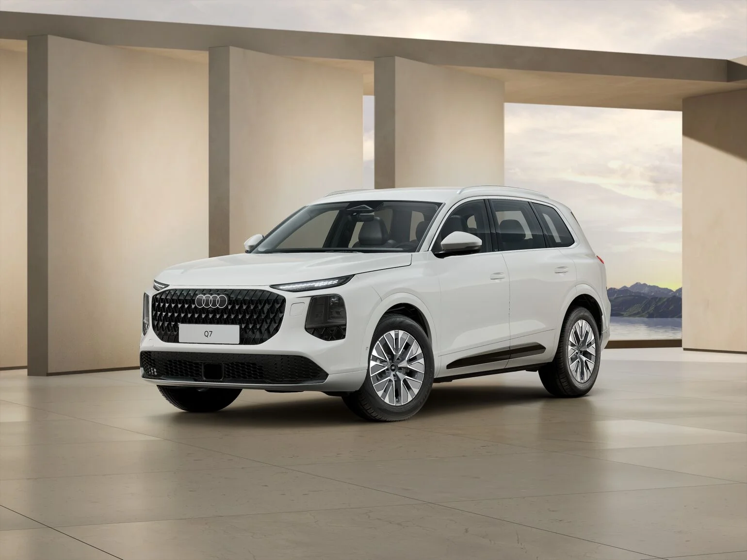 Weißer Audi Q7 in seitlicher Frontansicht.jfif